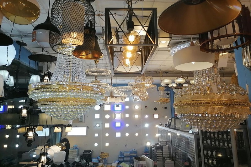 choosing lights at a lighting shop